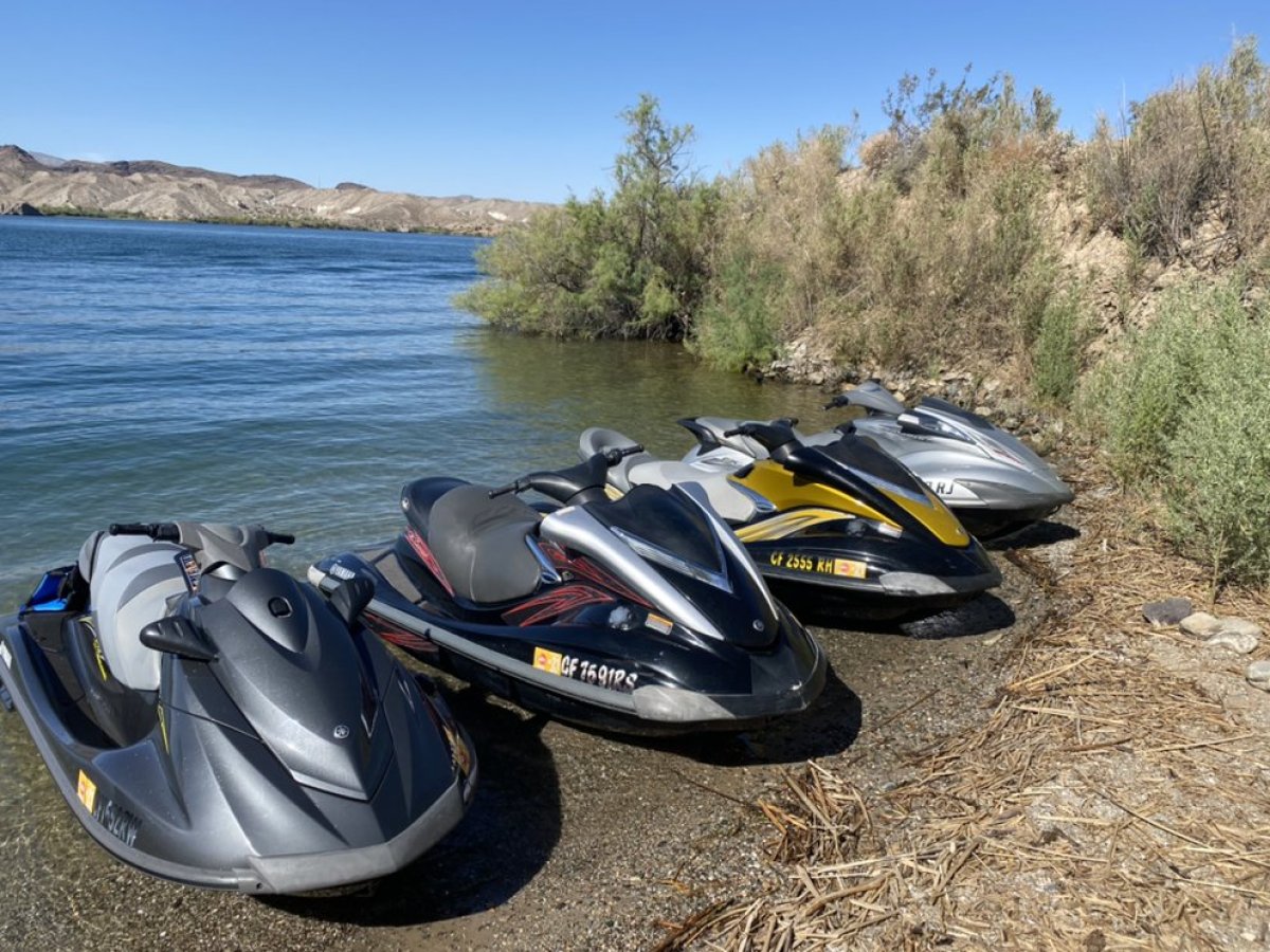 Multiple Jet Ski near a body of water